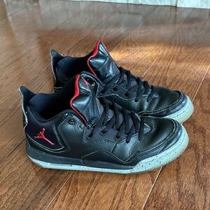 Boys Black and Red High-Top Jordan Sneakers